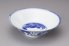 A blue and white conical bowl