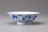 A blue and white conical bowl
