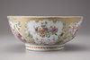 A Chinese export porcelain famille rose Mandarin palette punch bowl