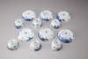 Set of six blue and white cups and saucers