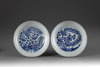 A pair of blue and white dishes