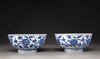 A pair of blue and white 'floral' bowls