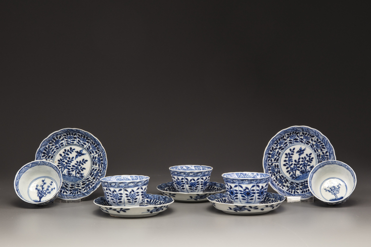 Five blue and white porcelain cups and saucers