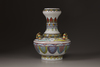 A polychrome porcelain vase