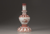 An iron red porcelain vase
