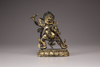 A Tibetan gilt bronze figure of Hayagriva