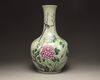 A Chinese celadon-ground famille rose bottle vase