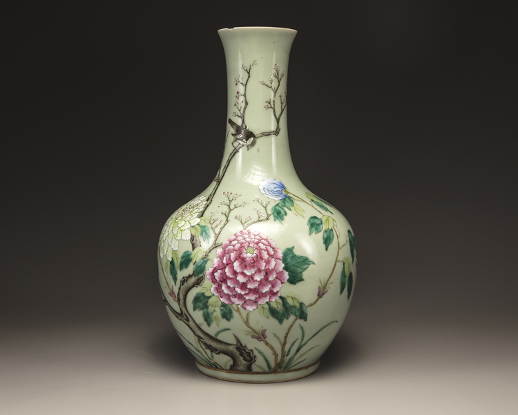 A Chinese celadon-ground famille rose bottle vase