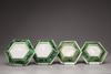 Two pairs of hexagonal biscuit porcelain sweetmeat dishes