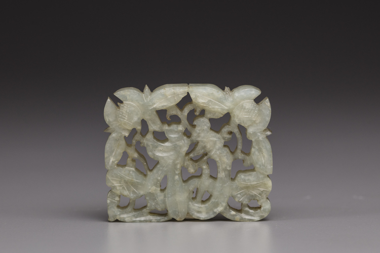 A pale celadon openwork jade plaque