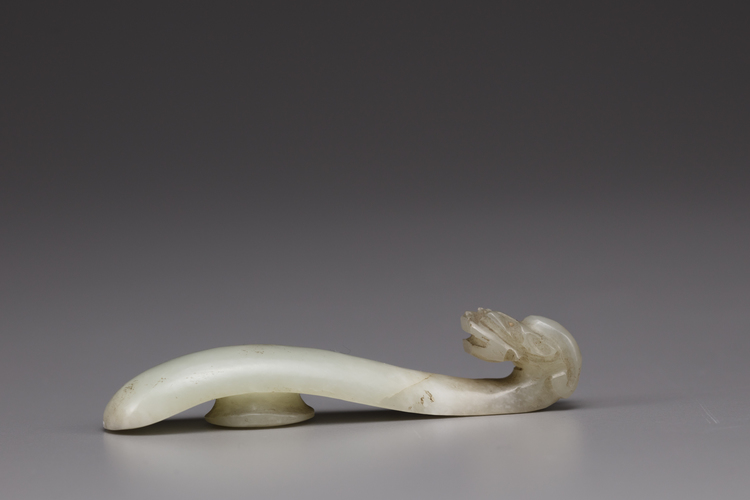 A pale celadon jade belt hook