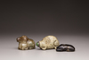 Two jade animal carvings and a jade snuff bottle