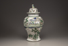 A famille verte baluster vase and a cover