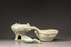 A GREEN-GLAZED RED POTTERY MODEL OF A YI, A LADLE AND BRAZIER, HAN DYNASTY (206 BC - 220 AD)
