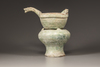 A GREEN-GLAZED RED POTTERY MODEL OF A YI, A LADLE AND BRAZIER, HAN DYNASTY (206 BC - 220 AD)
