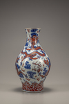 An iron-red-decorated blue and white trilobed vase