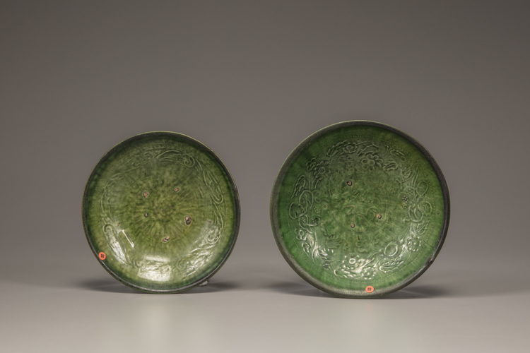 Two emerald-green-glazed bowls