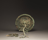 A bronze money tree
