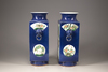 A pair of powder-blue-ground famille verte square-section vases, cong