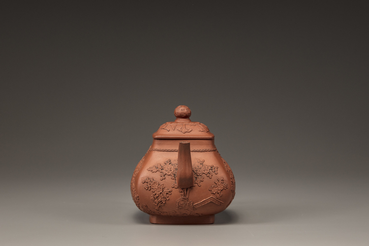 A Yixing 'appliqué-decorated' teapot