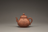 A Yixing 'appliqué-decorated' teapot