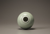 A small celadon-glazed water pot