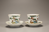 Two pairs of famille rose 'deer and lingzhi' cups and saucers