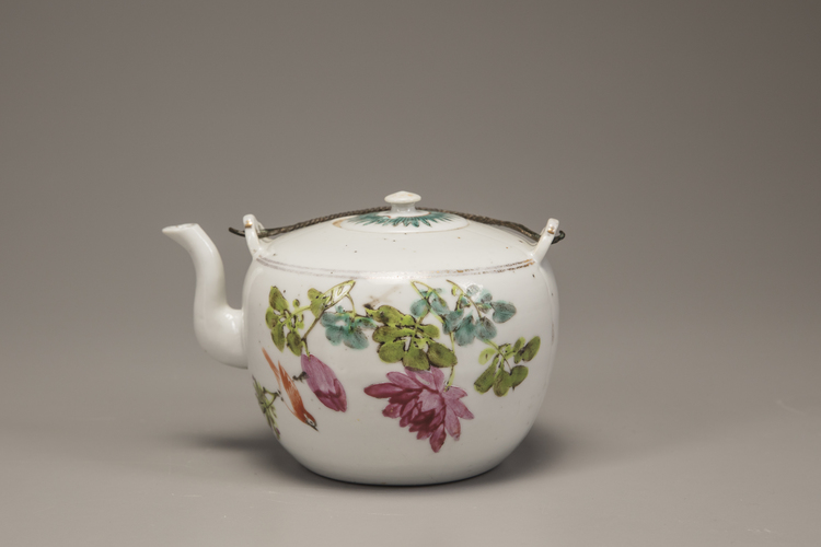 A famille rose 'birds and flowers' teapot and cover