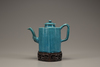 A turquoise-glazed wine pot and cover