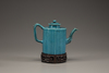 A turquoise-glazed wine pot and cover