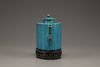 A turquoise-glazed wine pot and cover