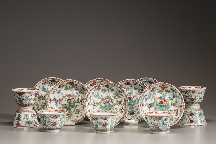 Seven sets of famille verte cups and saucers