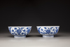 A pair of blue and white 'floral' bowls