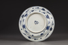 A blue and white 'phoenix' dish