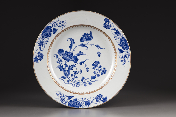 A blue enamelled plate