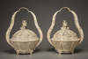 A pair of Cantonese ivory baskets and covers