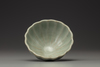 A small Lonquan celadon-glazed fluted bowl