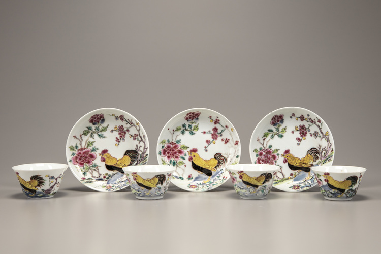 Four famille rose 'cockerel' cups and three 'cockerel' saucers