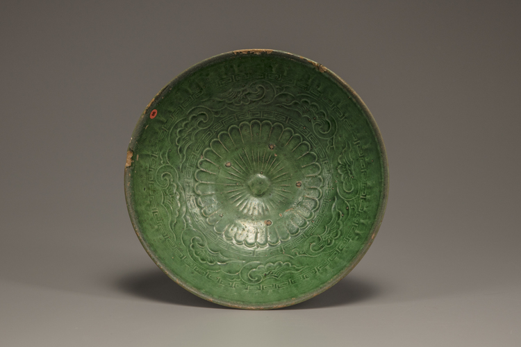 An emerald-green-glazed bowl
