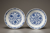 A pair of blue and white lotus dishes