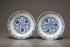A pair of blue and white lotus dishes