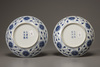 A pair of blue and white lotus dishes