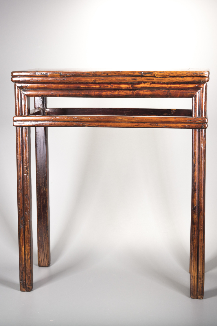 A lacquered elm altar table