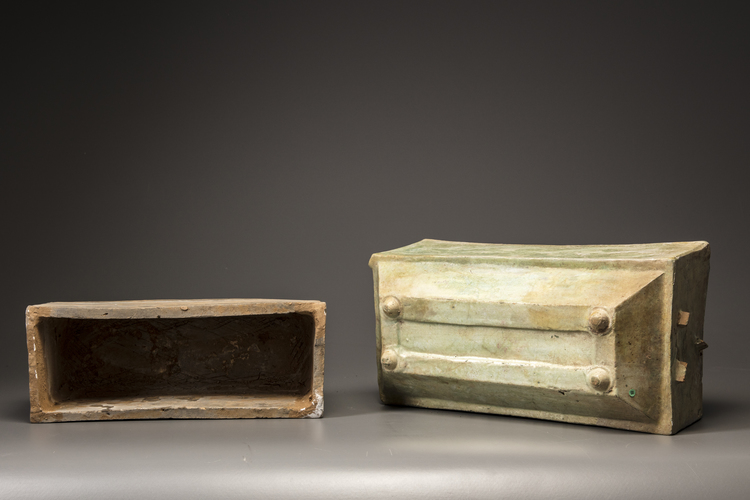 A green-glazed pottery food box and cover