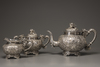 A three-piece export silver tea set