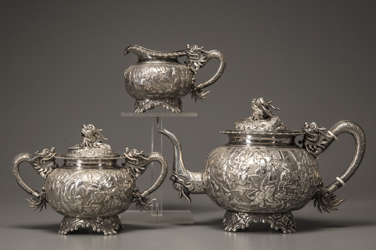 A three-piece export silver tea set