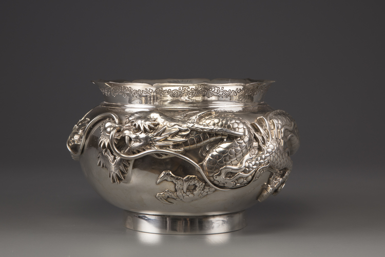 A silver ‘dragon' foliate rim punch bowl