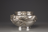 A silver ‘dragon' foliate rim punch bowl