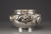 A silver ‘dragon' foliate rim punch bowl