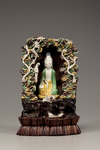 A Chinese green, yellow, and aubergine-glazed grotto